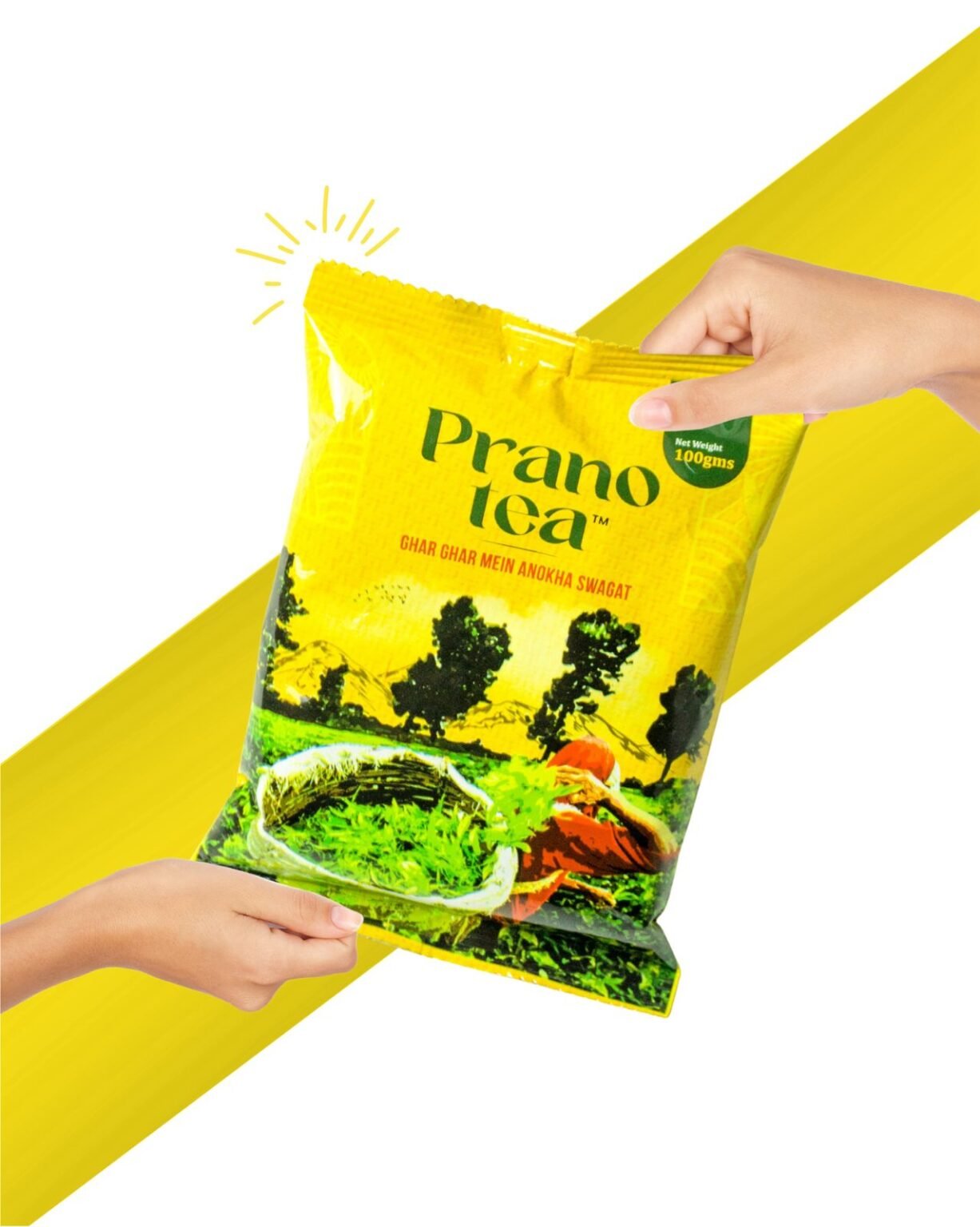 Prano Tea 100g yellow packaging with tagline “Ghar Ghar Mein Anokha Swagat,” showing fresh tea leaves and farmer illustration, held by two hands.